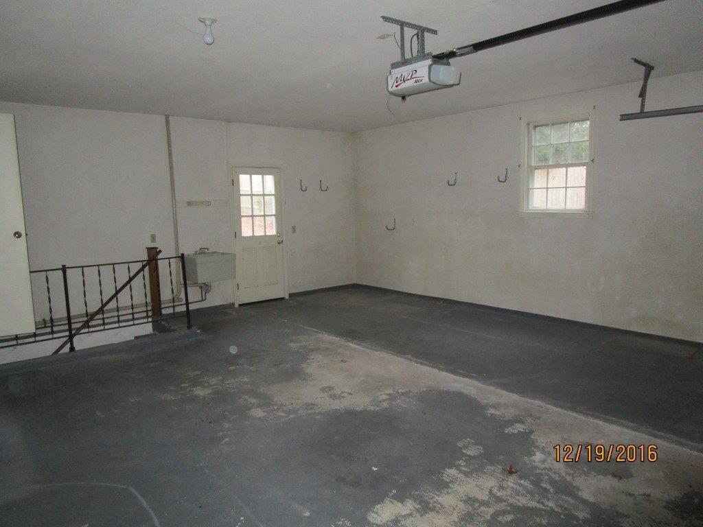 64 McNamara Road West Yarmouth, MA 02673 - Photo 13 of 14 an empty room with a empty space and windows