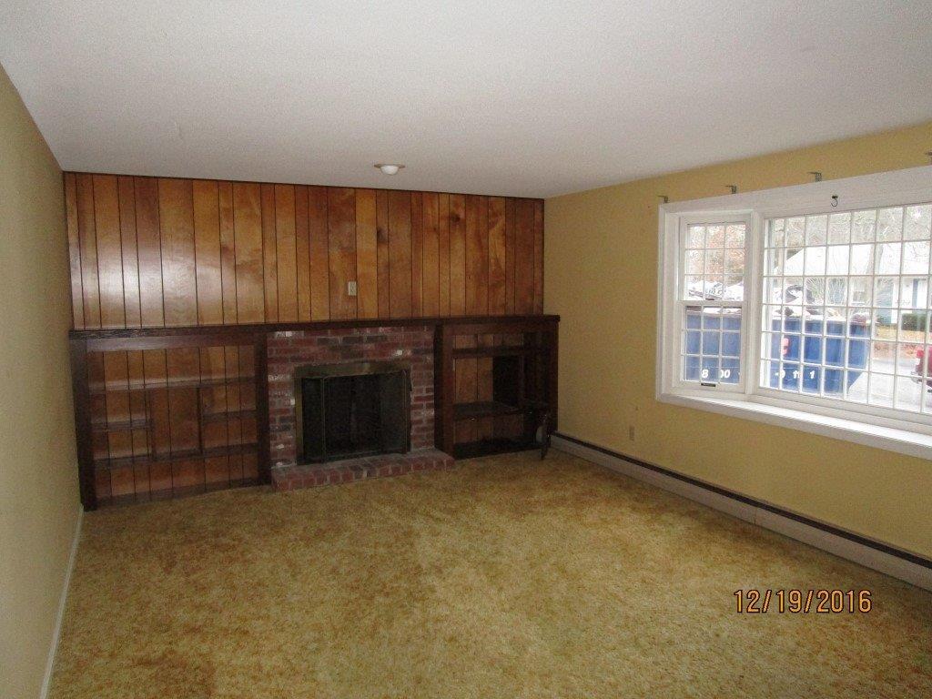 64 McNamara Road West Yarmouth, MA 02673 - Photo 3 of 14 a view of an empty room with a window