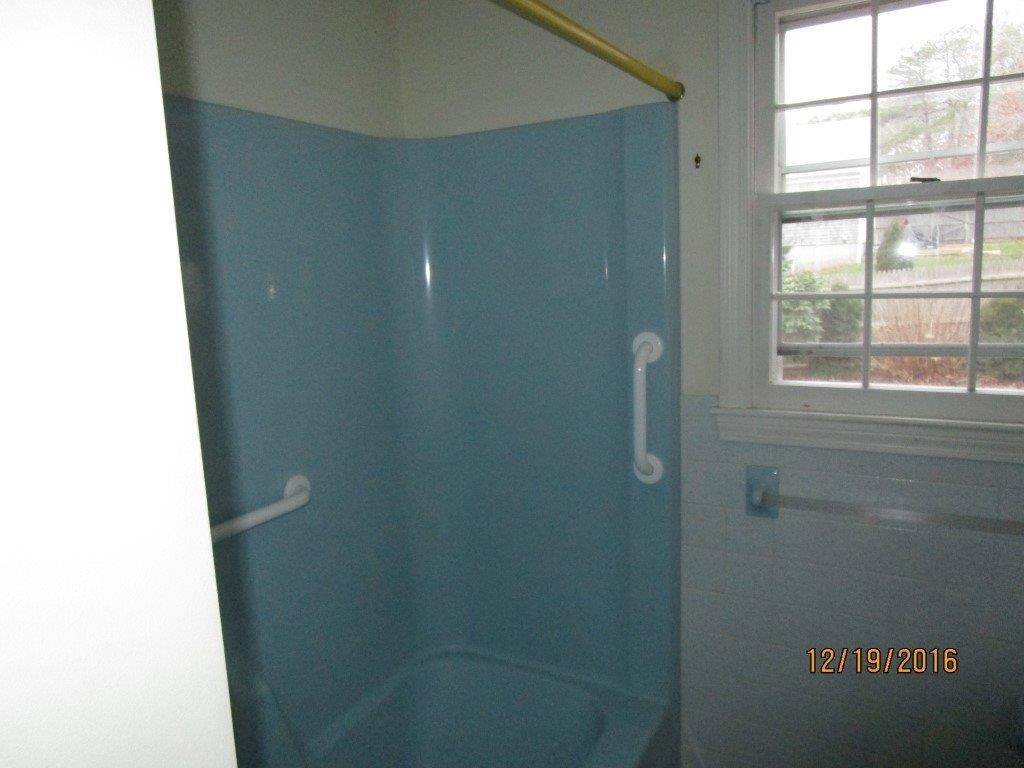 64 McNamara Road West Yarmouth, MA 02673 - Photo 8 of 14 a bathroom with a shower