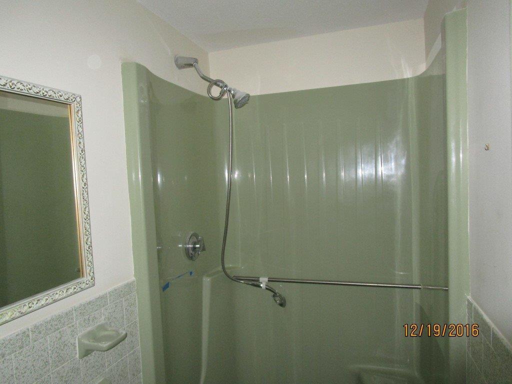 64 McNamara Road West Yarmouth, MA 02673 - Photo 10 of 14 a bathroom with a glass shower door