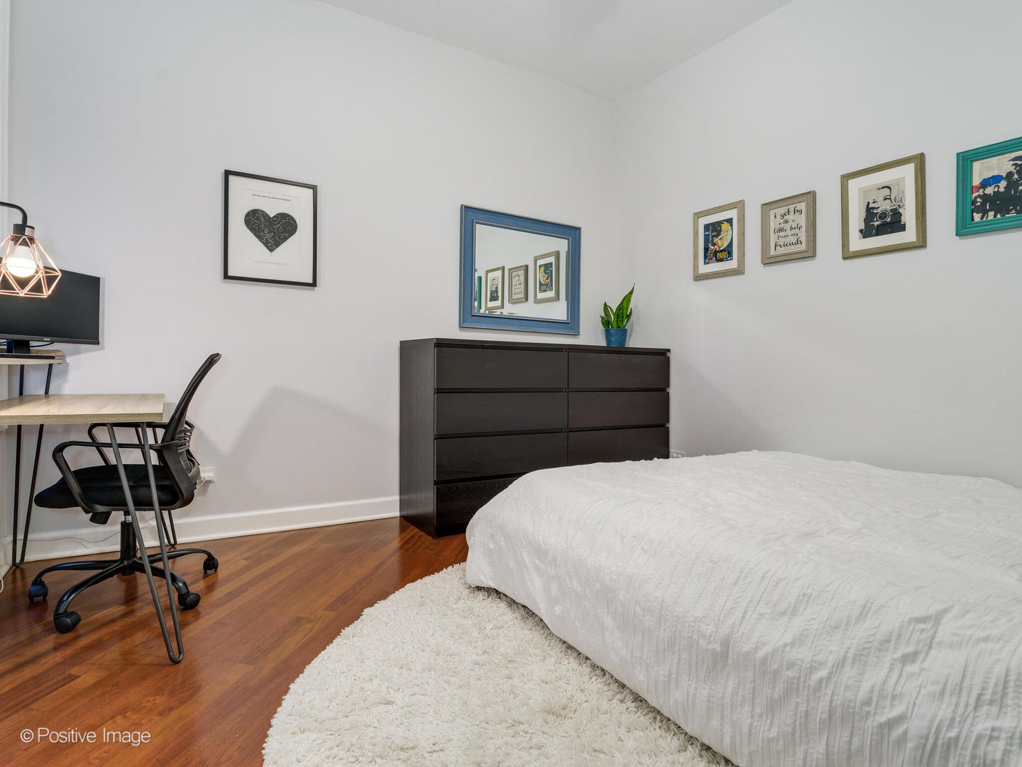 2124 West Rice Street, Unit 2 Chicago, IL 60622 - Photo 22 of 29 a bedroom with a bed and a desk