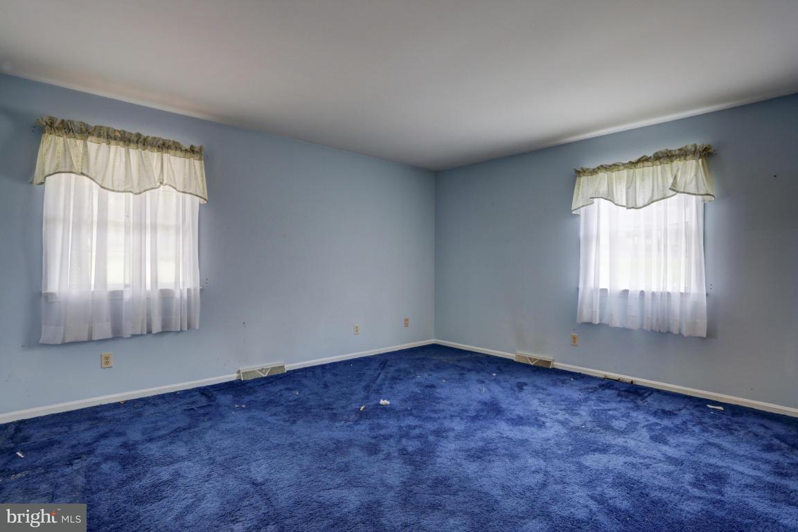 411 South Belmont Road Paradise, PA 17562 - Photo 15 of 25 an empty room with windows