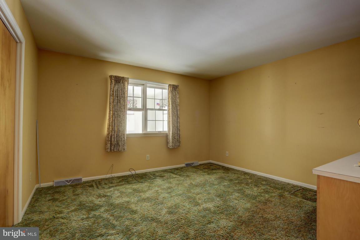 411 South Belmont Road Paradise, PA 17562 - Photo 17 of 25 a view of an empty room and window