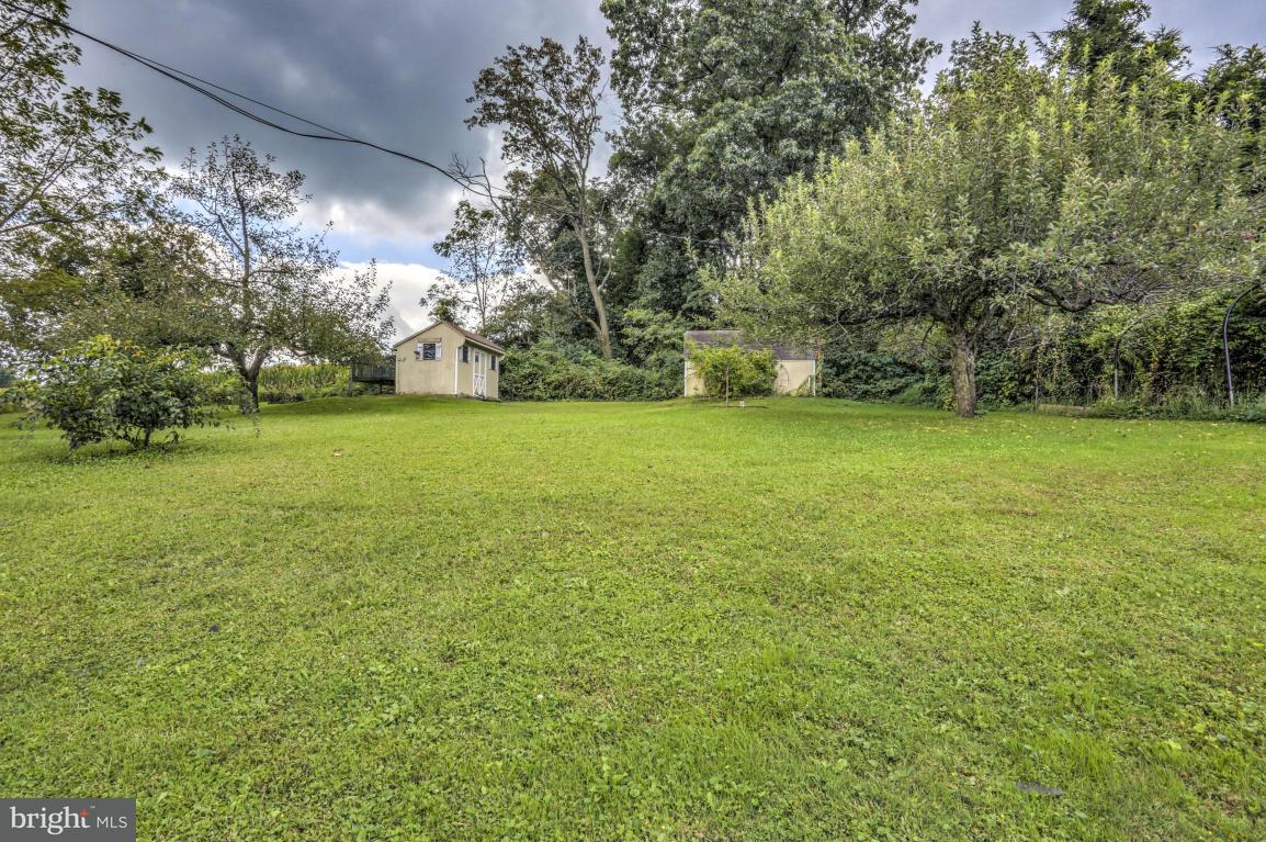 411 South Belmont Road Paradise, PA 17562 - Photo 23 of 25 a view of a green field with lots of bushes