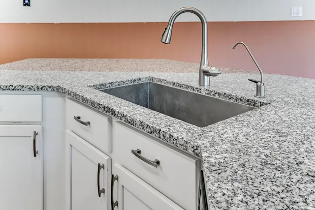 a close view of a sink and tap