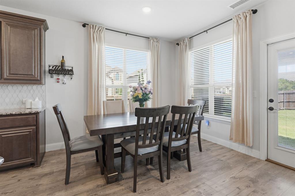 1316 Tree Shadow Lane Anna, TX 75409 - Photo 11 of 40 This dining space is large enough to accommodate furniture for day to day meals or larger gatherings.