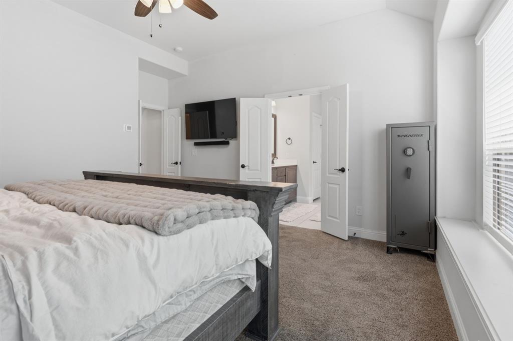 1316 Tree Shadow Lane Anna, TX 75409 - Photo 21 of 40 View to the ensuite bath in the primary bedroom
