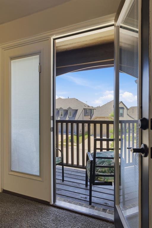 1316 Tree Shadow Lane Anna, TX 75409 - Photo 28 of 40 This exits to the upstairs balcony from the game room. Enjoy a nice spot for a drink!