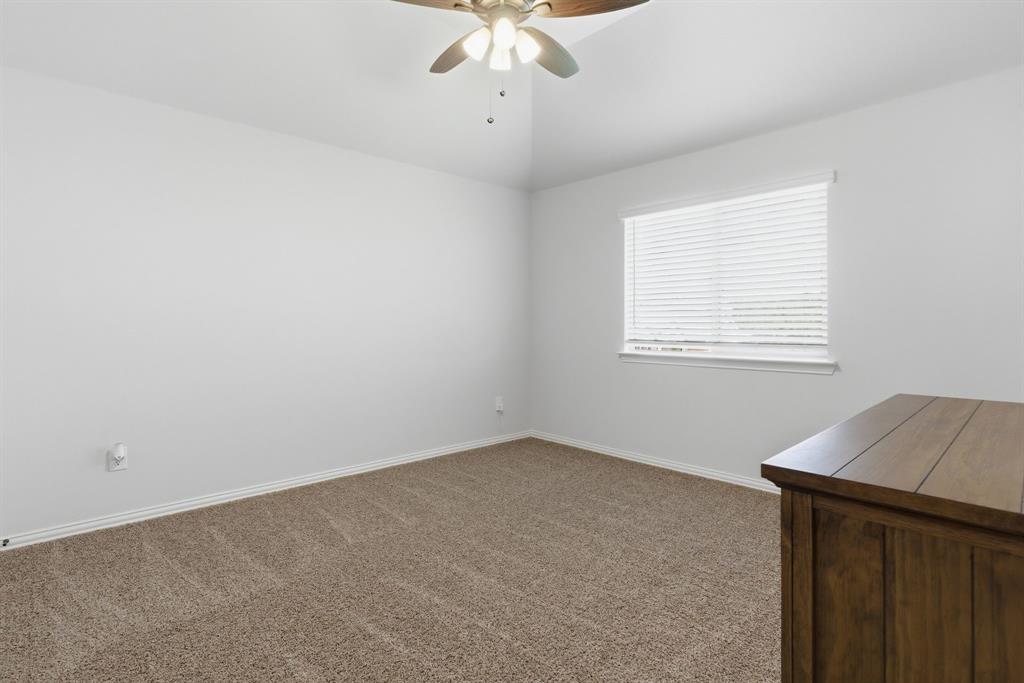 1316 Tree Shadow Lane Anna, TX 75409 - Photo 32 of 40 Another of the 3 upstairs secondary bedrooms.