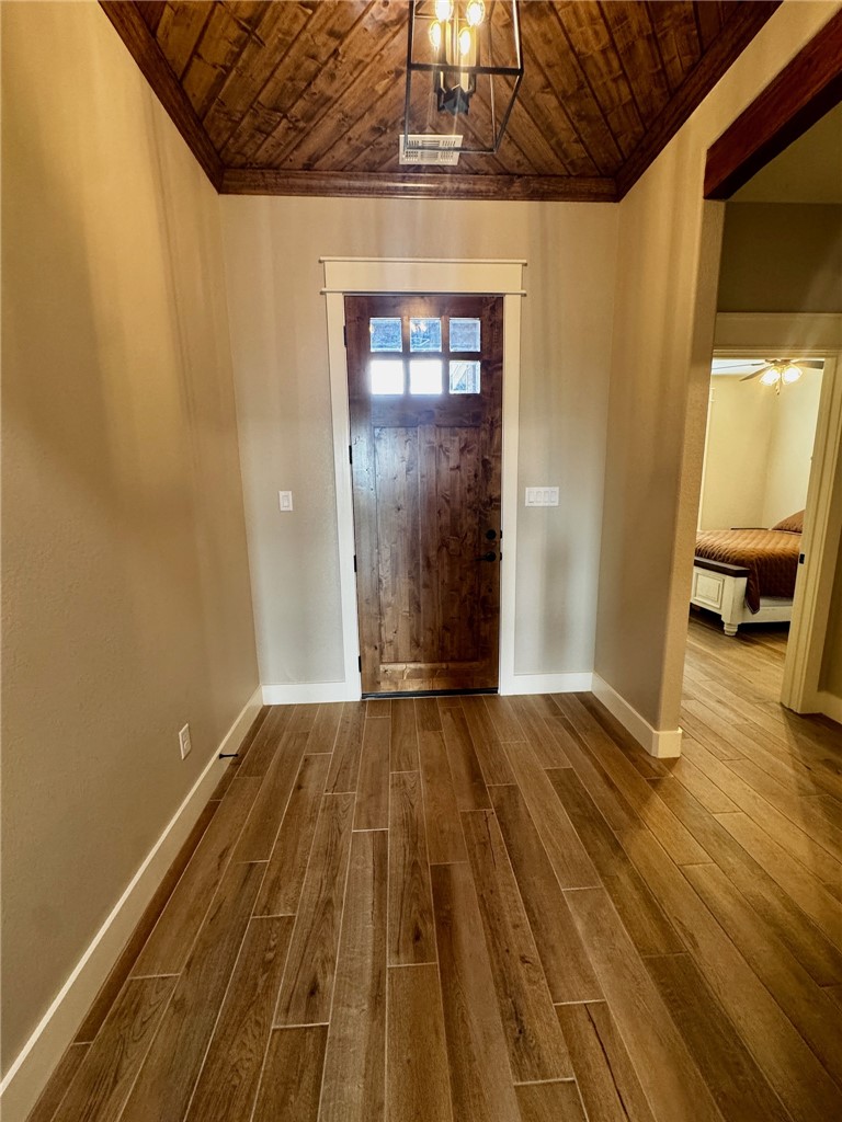 5854 Reliance Rdg Circle Bryan, TX 77808 - Photo 17 of 32 a view of empty room with wooden floor