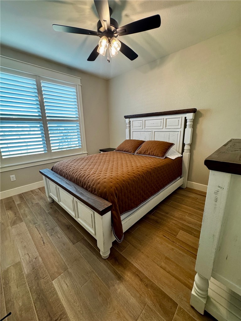 5854 Reliance Rdg Circle Bryan, TX 77808 - Photo 29 of 32 a bed sitting in a bedroom next to a window