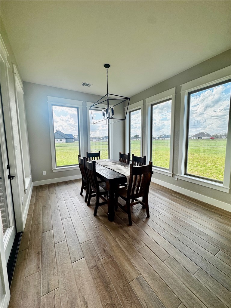 5854 Reliance Rdg Circle Bryan, TX 77808 - Photo 5 of 32 a view of a dining room with furniture and window