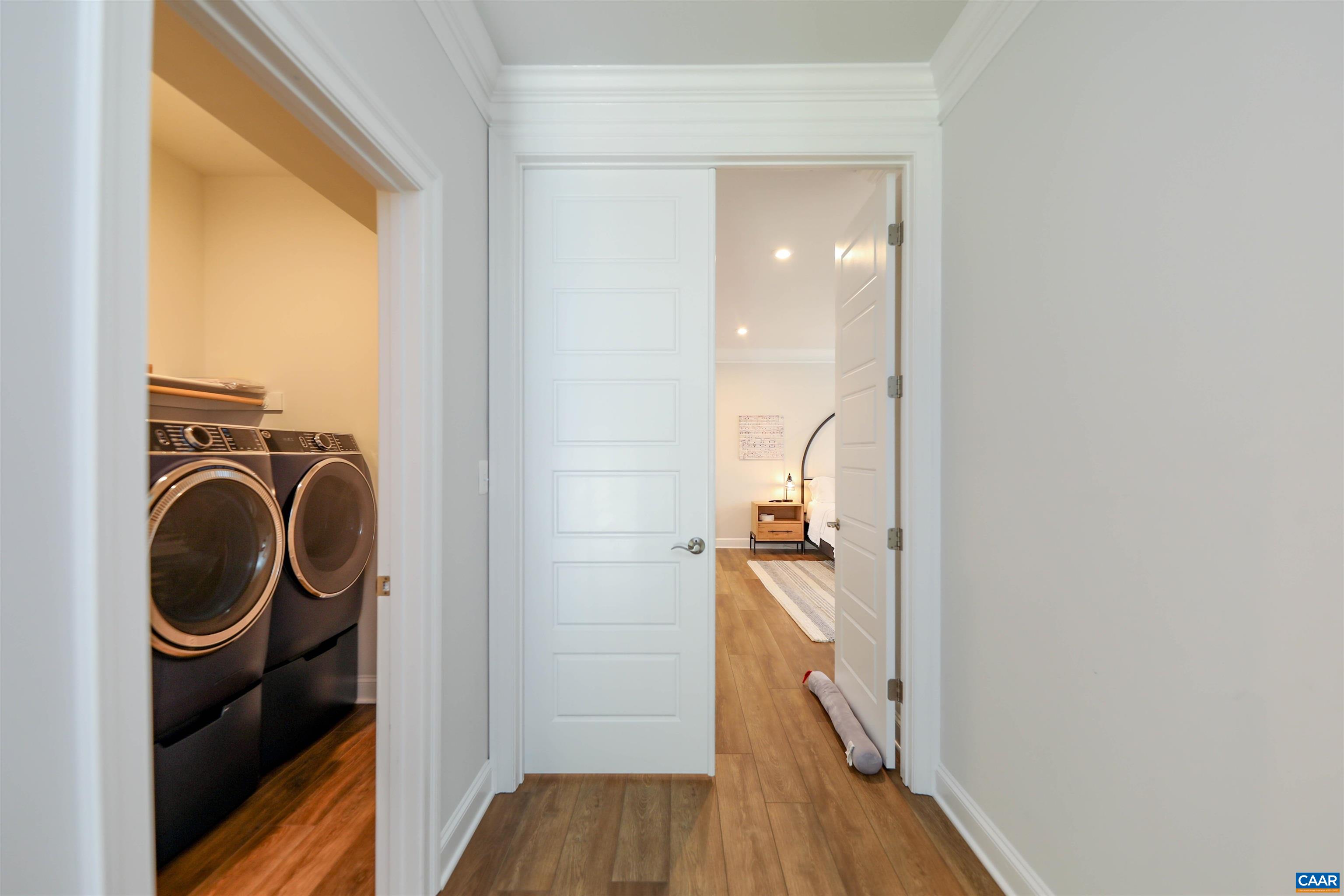 2483 Ferndown Lane Keswick, VA 22947 - Photo 22 of 54 a view of a hallway with washer and dryer