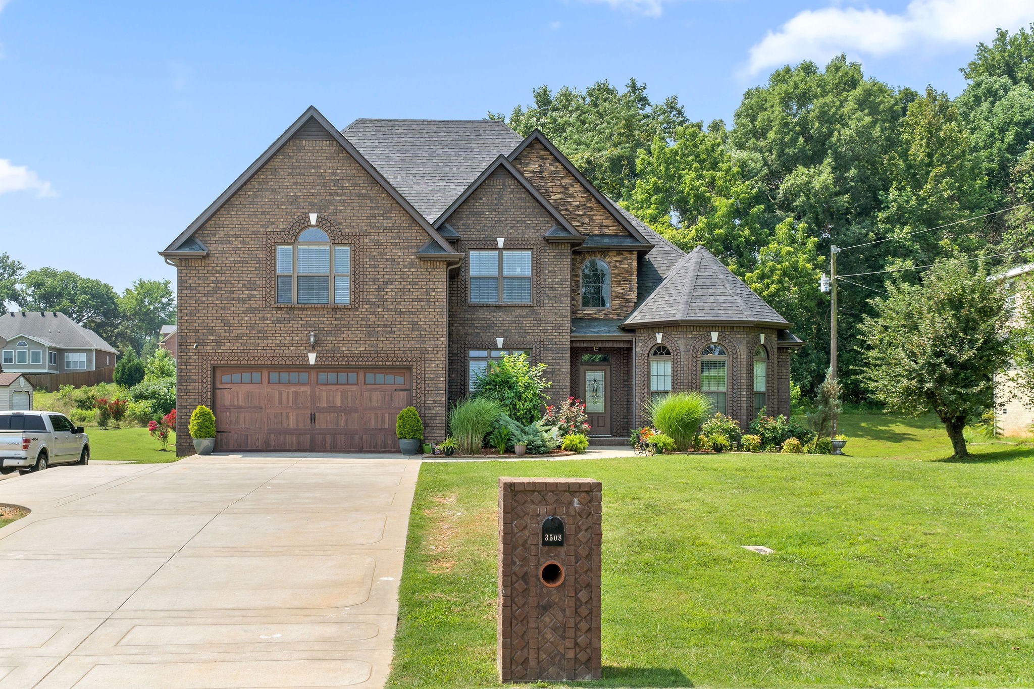 3508 Drake Road Adams, TN 37010 - Photo 1 of 35 a front view of a house with a yard