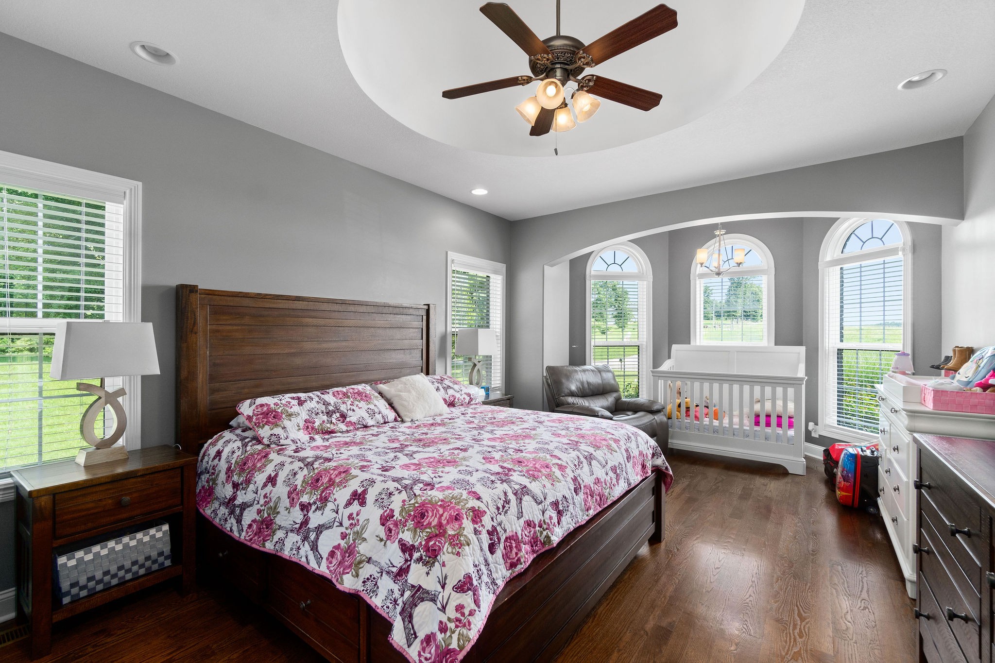 3508 Drake Road Adams, TN 37010 - Photo 18 of 35 a bedroom with a bed and a chandelier