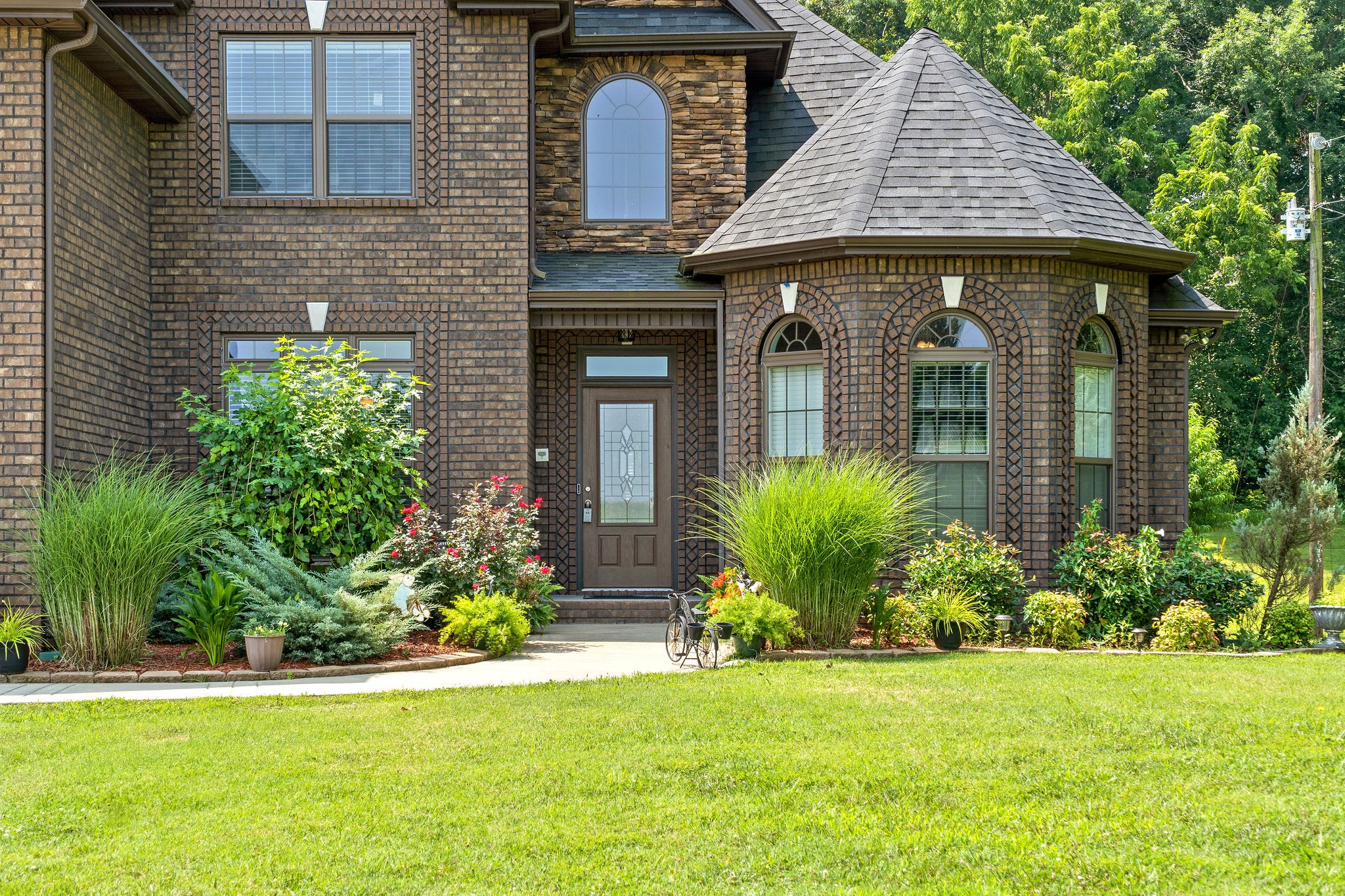 3508 Drake Road Adams, TN 37010 - Photo 3 of 35 a front view of a house with a yard