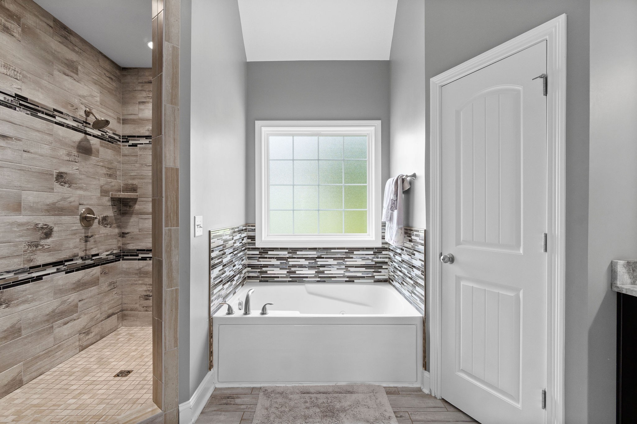 3508 Drake Road Adams, TN 37010 - Photo 21 of 35 a bathroom with a bathtub and shower