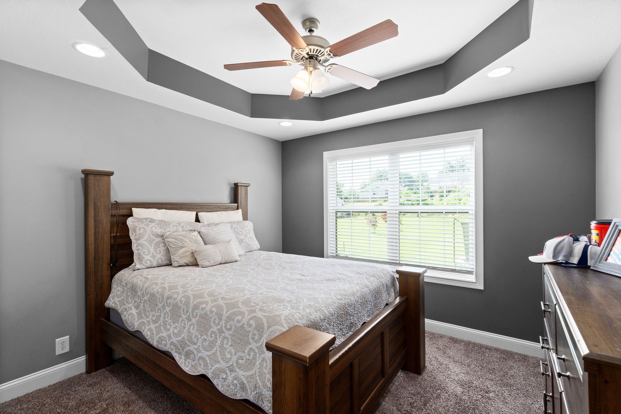 3508 Drake Road Adams, TN 37010 - Photo 24 of 35 a bedroom with a large bed and a chandelier