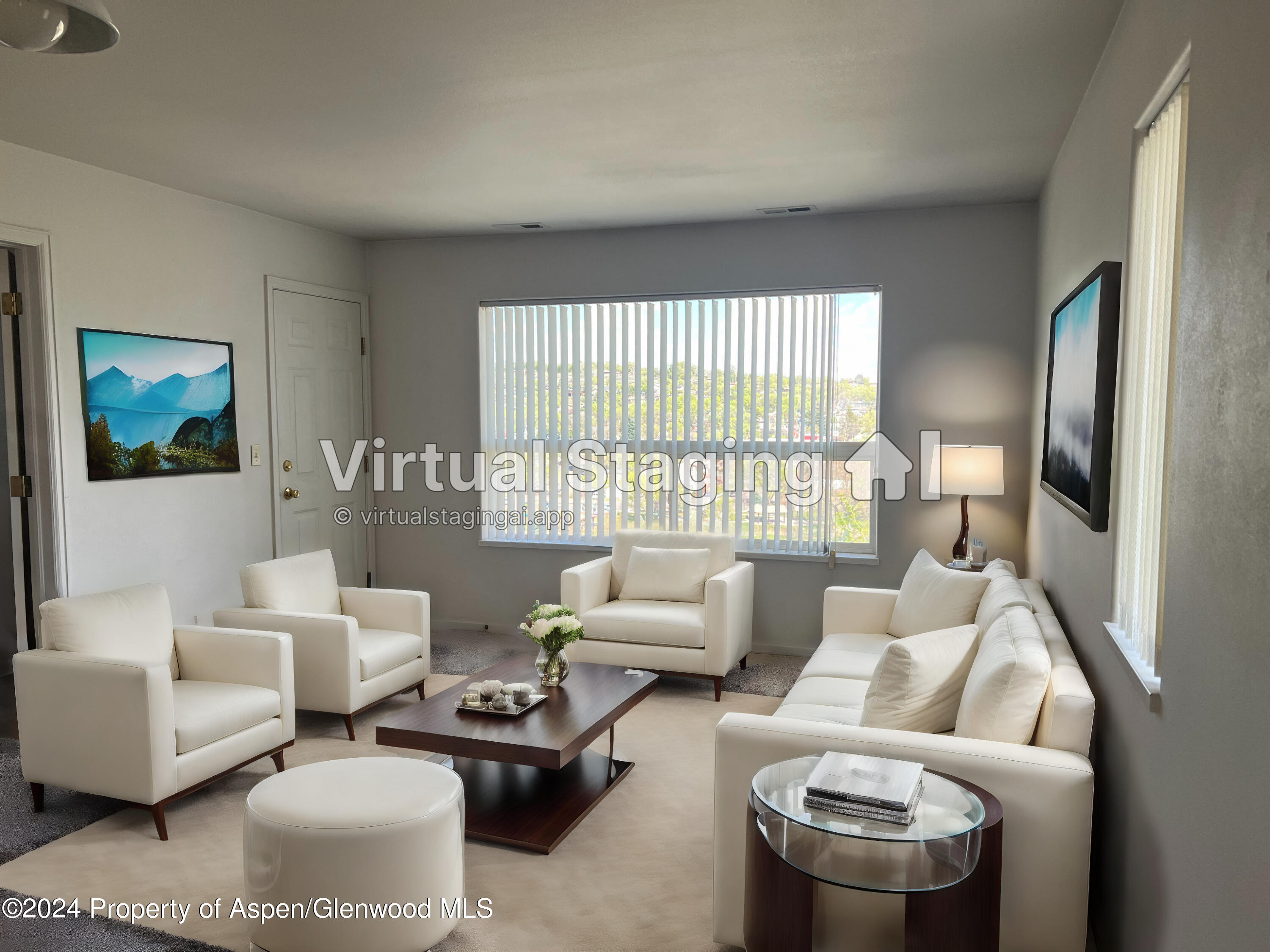 424 Lind Avenue Rifle, CO 81650 - Photo 5 of 24 a living room with furniture and a large window