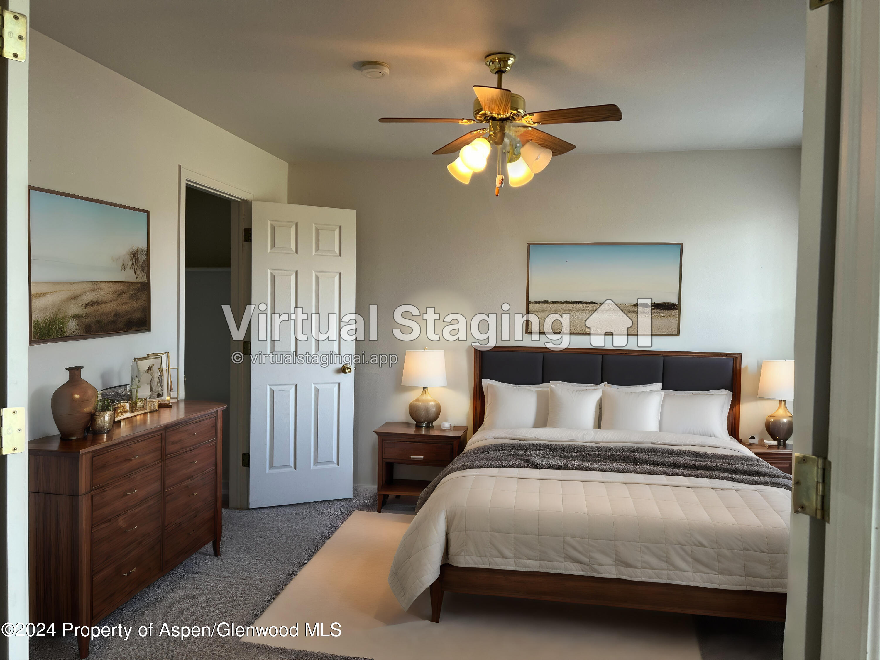 424 Lind Avenue Rifle, CO 81650 - Photo 10 of 24 a bedroom with a bed and ceiling fan