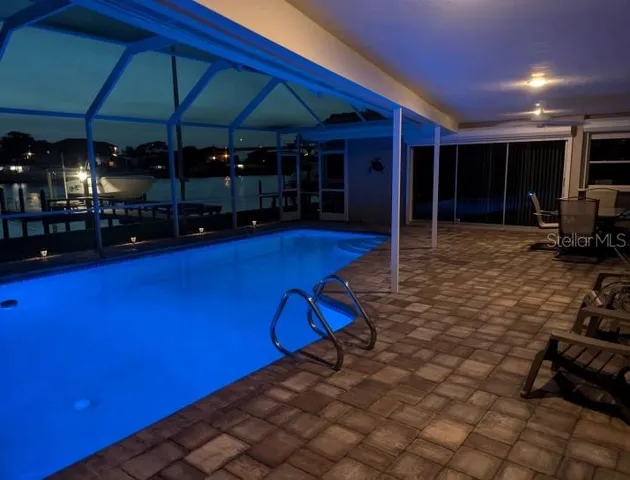 a view of a chairs and tables in patio of a house