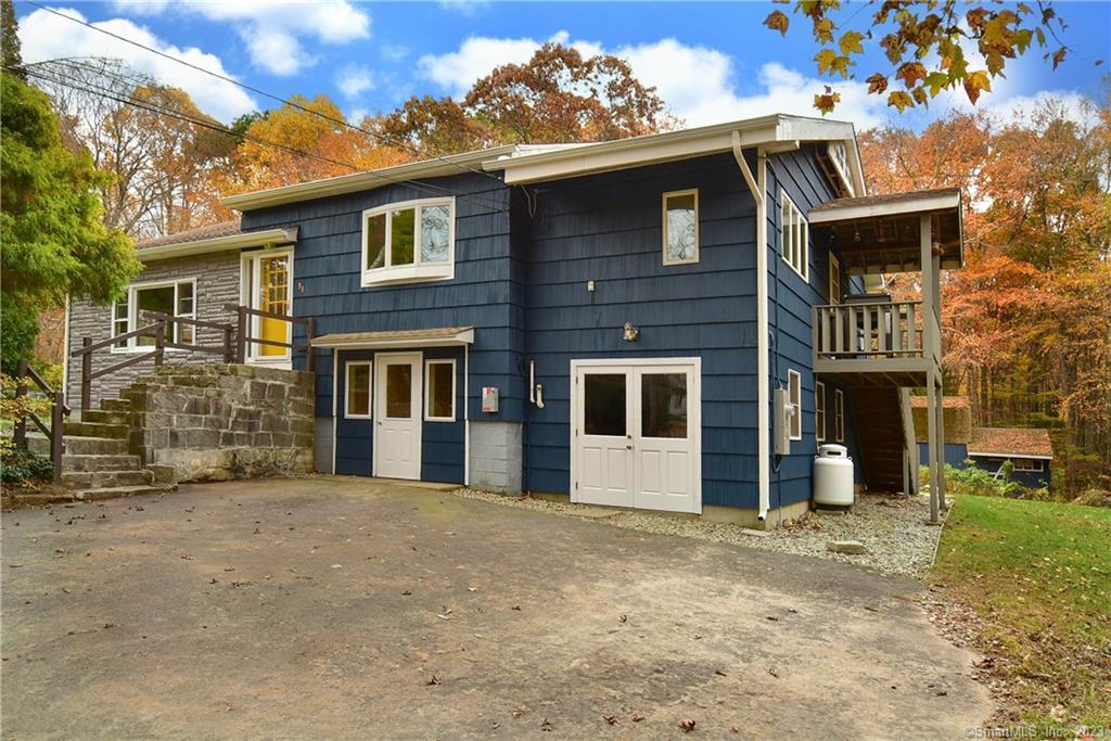 31 Staeth Road East Hampton, CT 06424 - Photo 1 of 1 a front view of a house with a yard