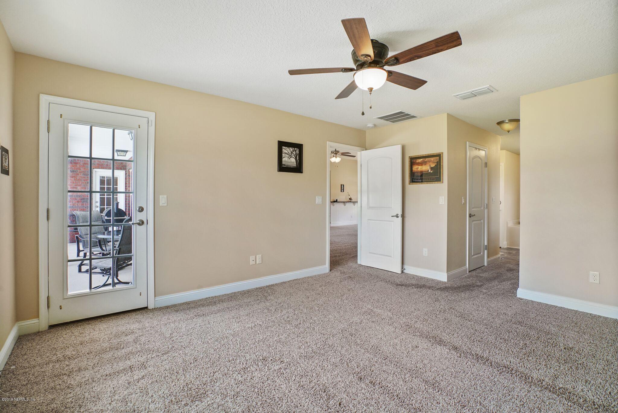 3007 Longleaf Ranch Circle Middleburg, FL 32068 - Photo 15 of 27 Master suite with door to patio