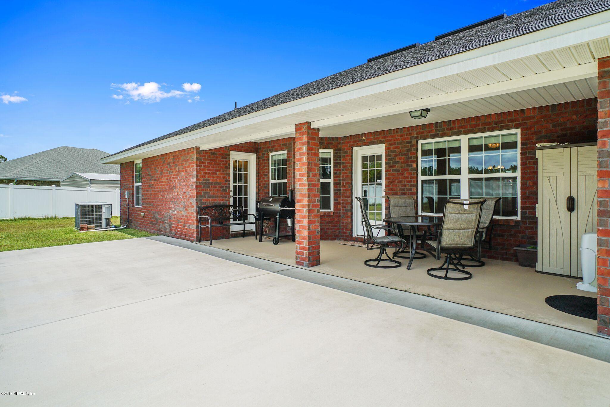 3007 Longleaf Ranch Circle Middleburg, FL 32068 - Photo 19 of 27 Back Patio with extended slab