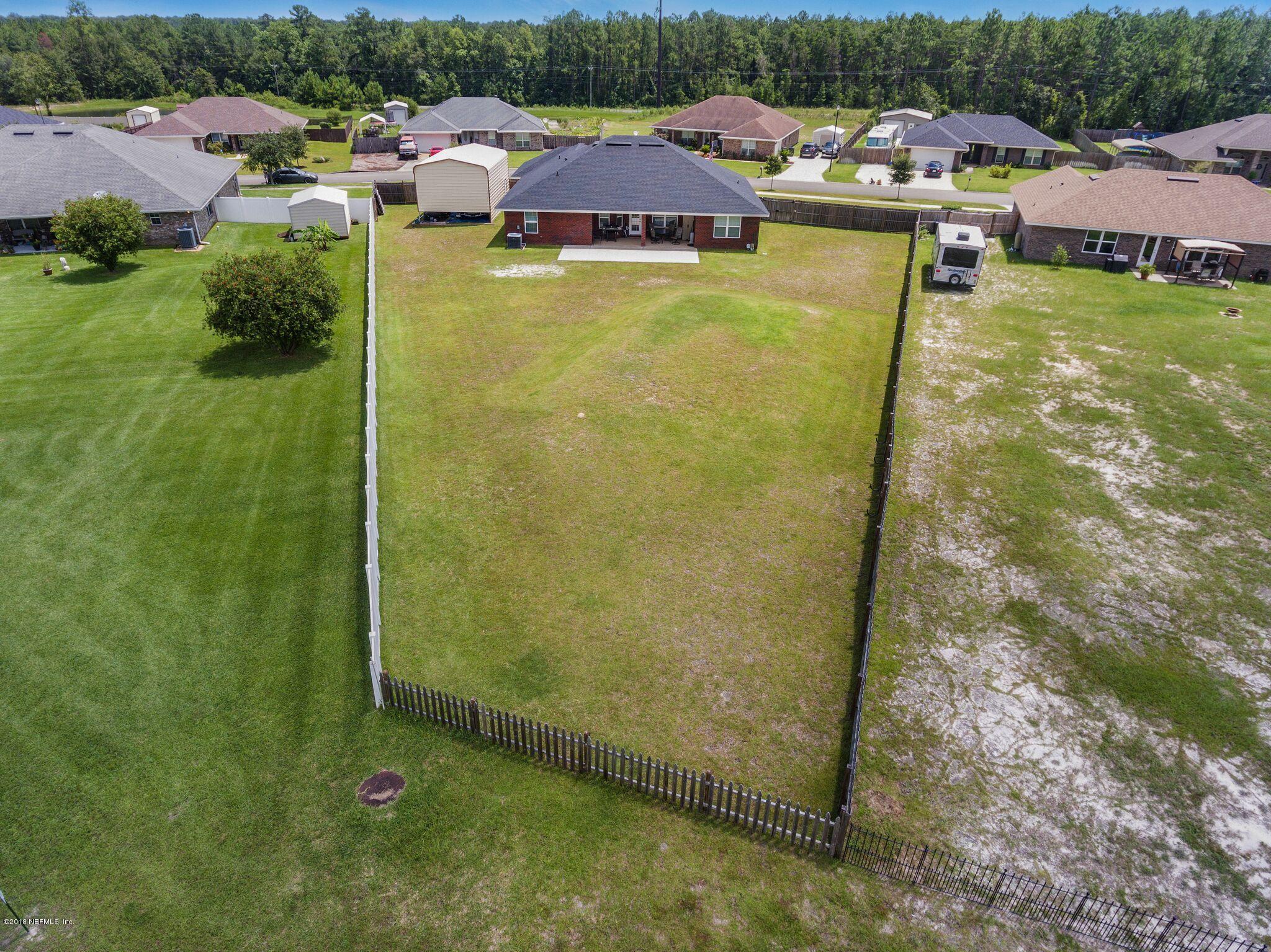 3007 Longleaf Ranch Circle Middleburg, FL 32068 - Photo 25 of 27 Rear view of almost an acre