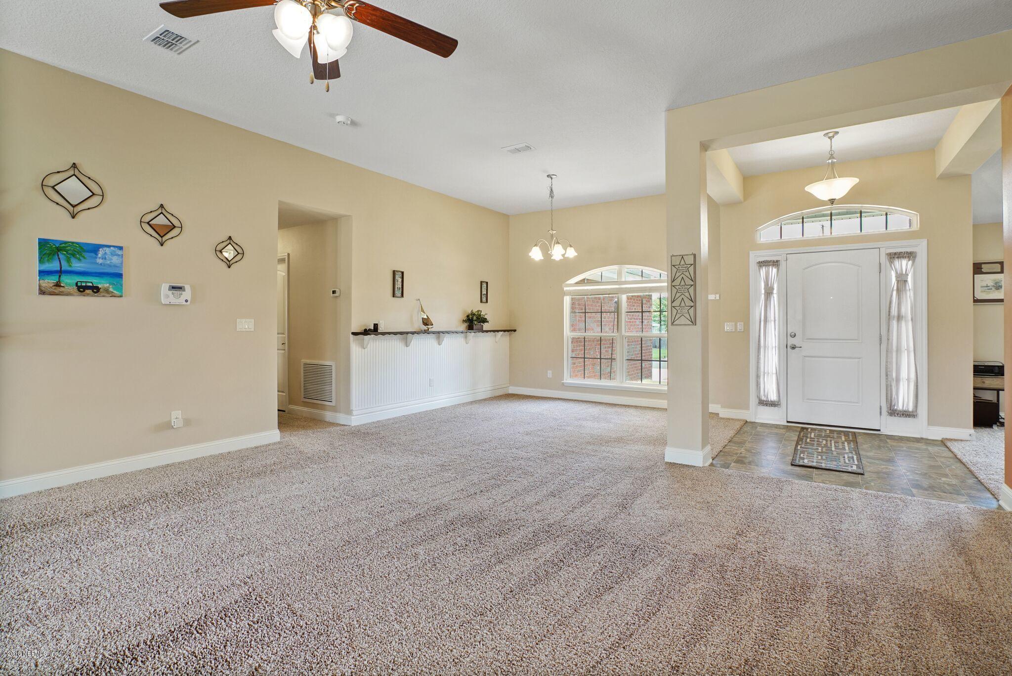 3007 Longleaf Ranch Circle Middleburg, FL 32068 - Photo 5 of 27 Formal dining room and entrance