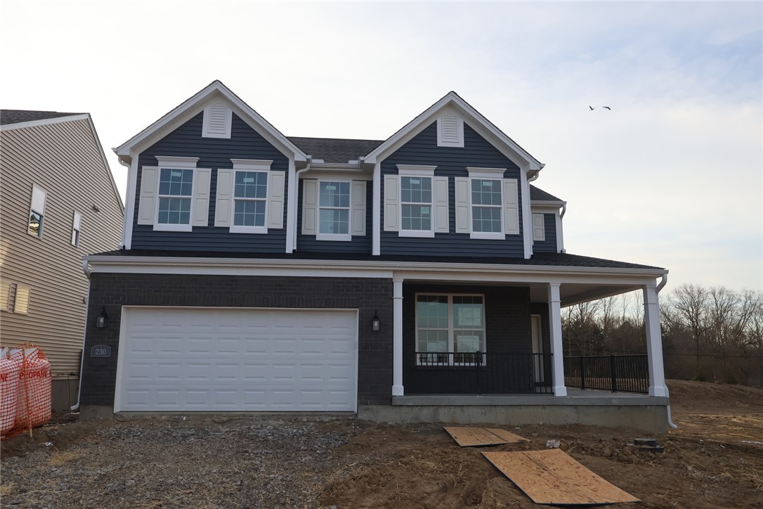230 Tilly Court, Unit 4 Springboro, OH 45066 - Photo 7 of 20 This modern home features charming architectural details and a welcoming front porch.