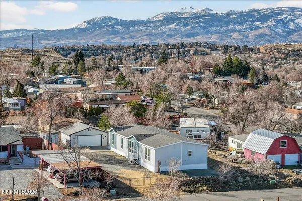 an aerial view of a house with a outdoor space