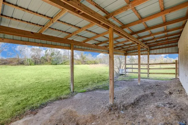 a view of a backyard with plants