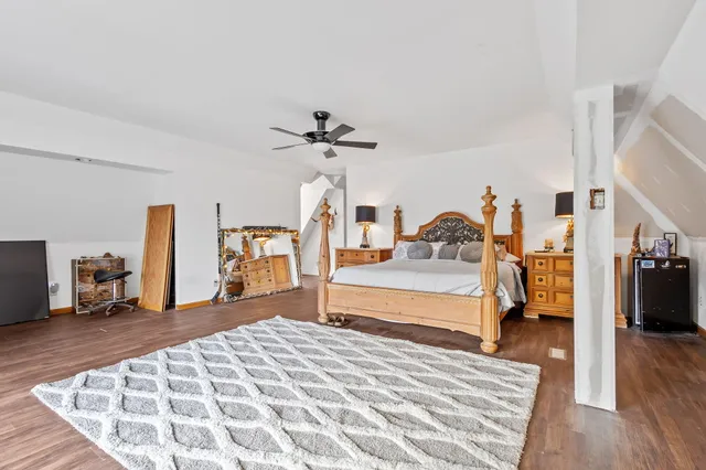a utility room with cabinets washer and dryer