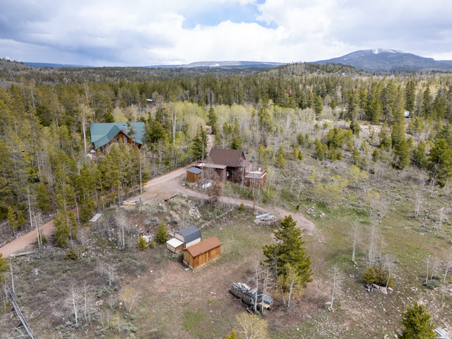 5082 Pine Crest Road Evanston, UT 82930 - Photo 25 of 25 Wooded acreage featuring multiple structures