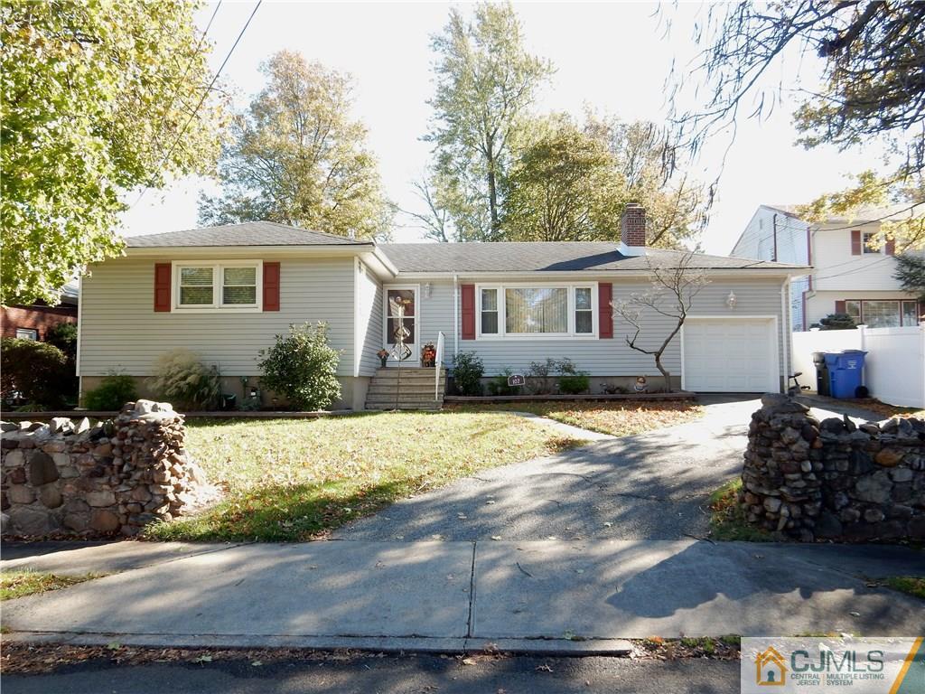 107 West Hill Road Colonia, NJ 07067 - Photo 1 of 16 a house view with a outdoor space