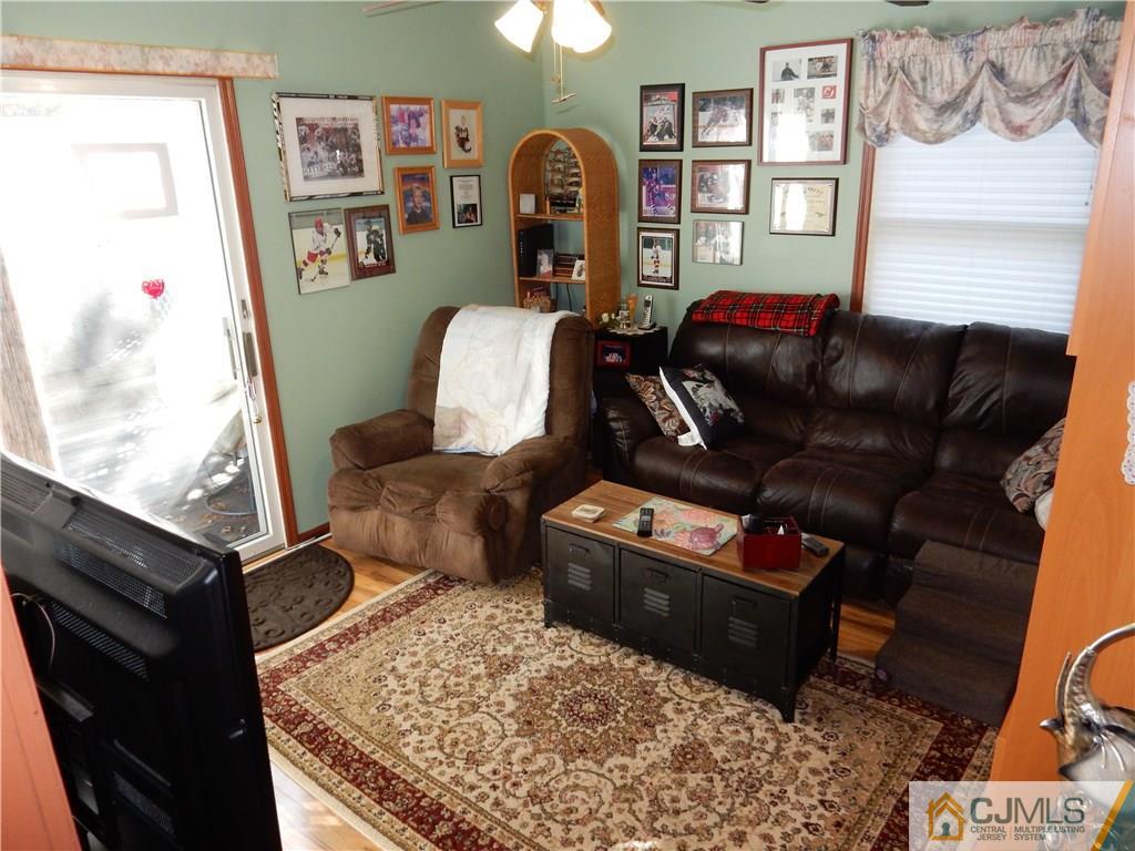 107 West Hill Road Colonia, NJ 07067 - Photo 7 of 16 a living room with furniture