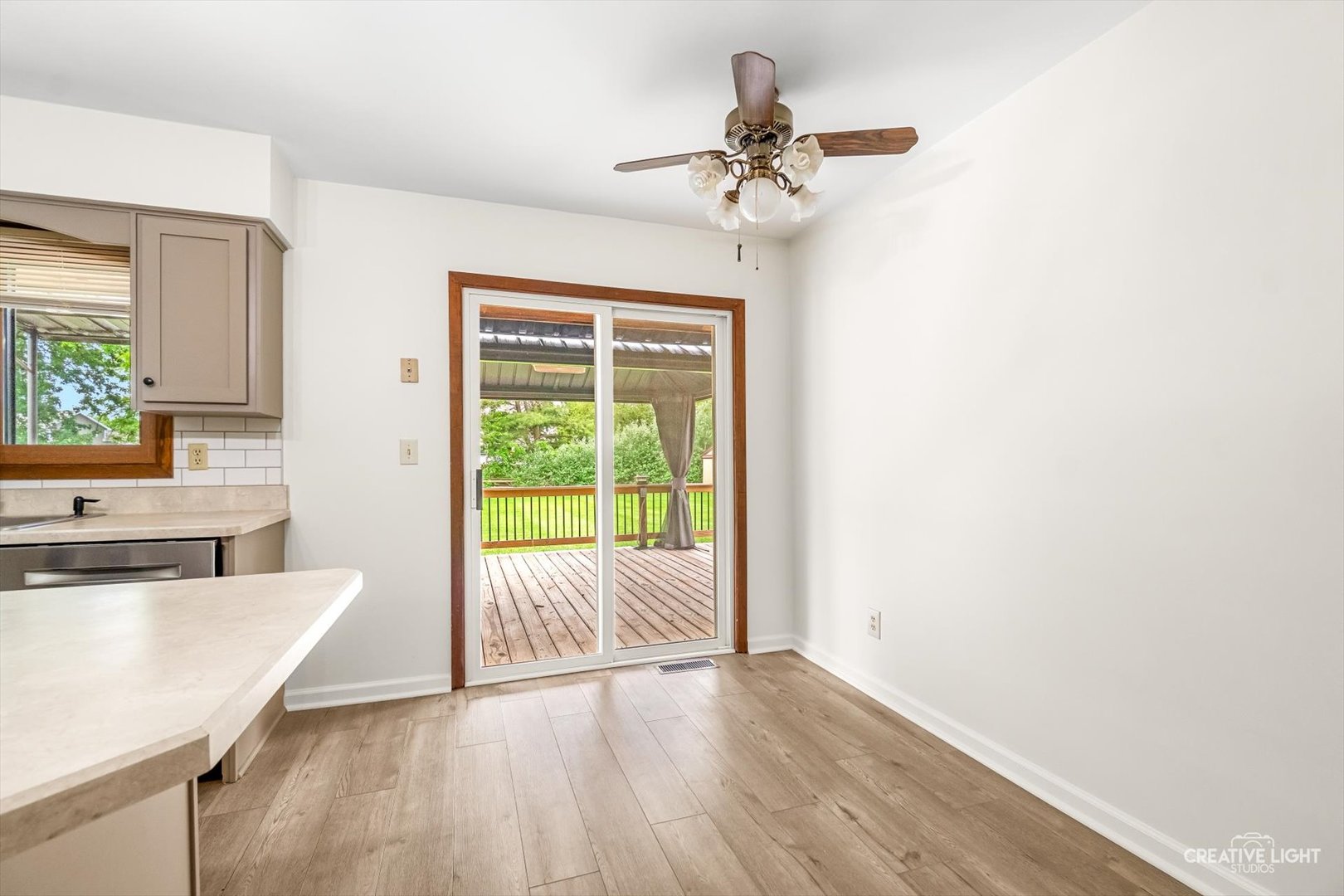 1483 Nova Road Sandwich, IL 60548 - Photo 6 of 29 a living room with furniture and a large window