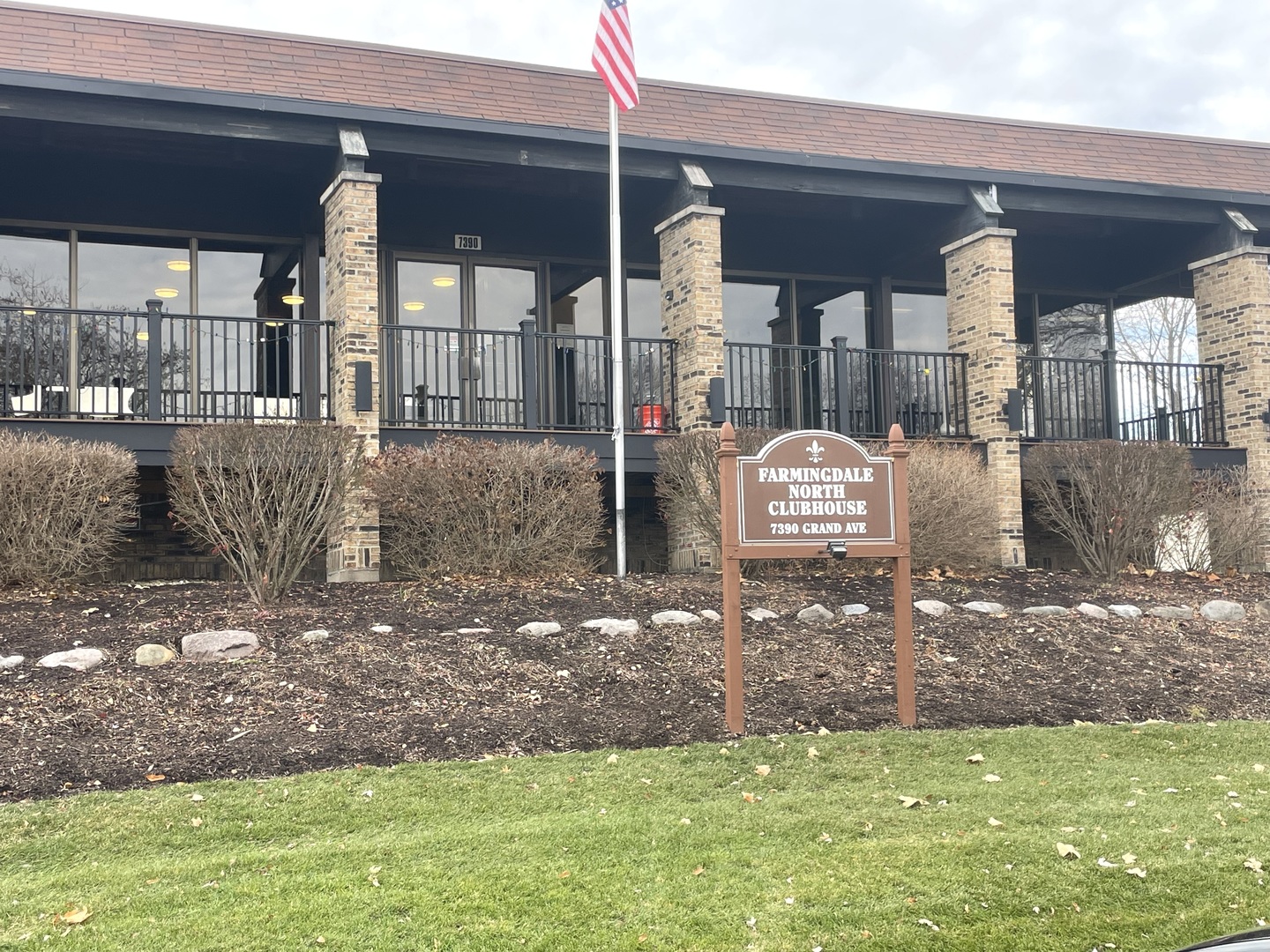 500 74th Street, Unit 102 Downers Grove, IL 60516 - Photo 15 of 21 a front view of a house with a yard