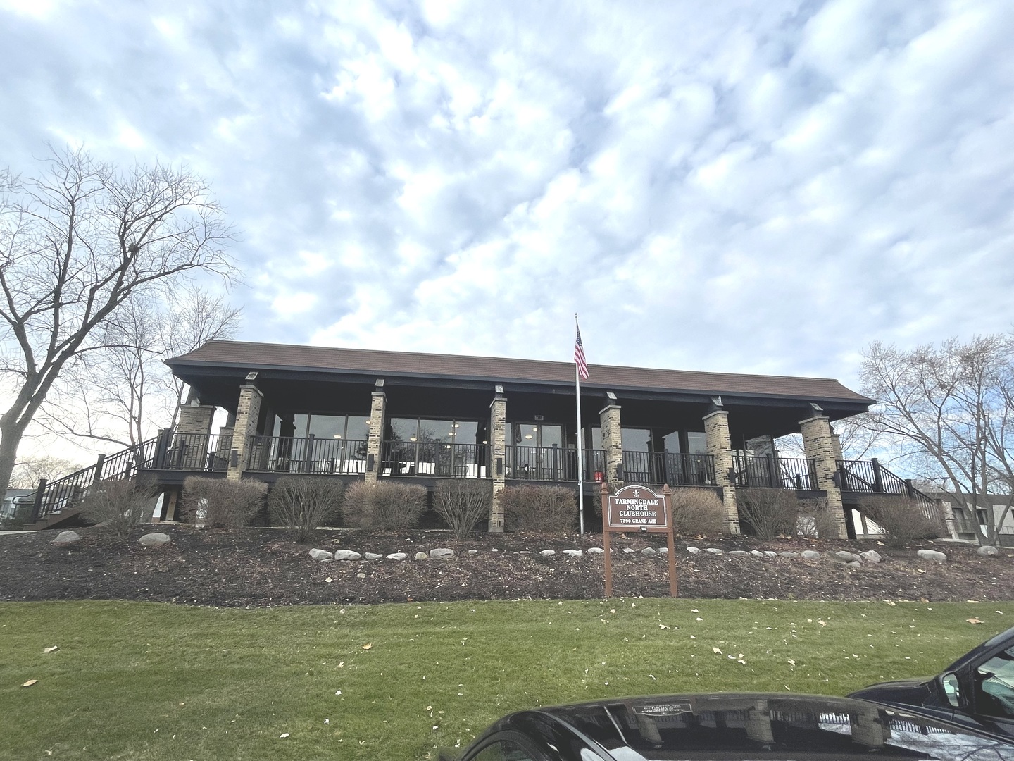 500 74th Street, Unit 102 Downers Grove, IL 60516 - Photo 16 of 21 a front view of a house with garden