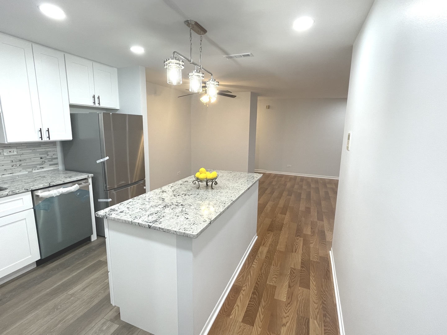 500 74th Street, Unit 102 Downers Grove, IL 60516 - Photo 6 of 21 a kitchen with sink and refrigerator