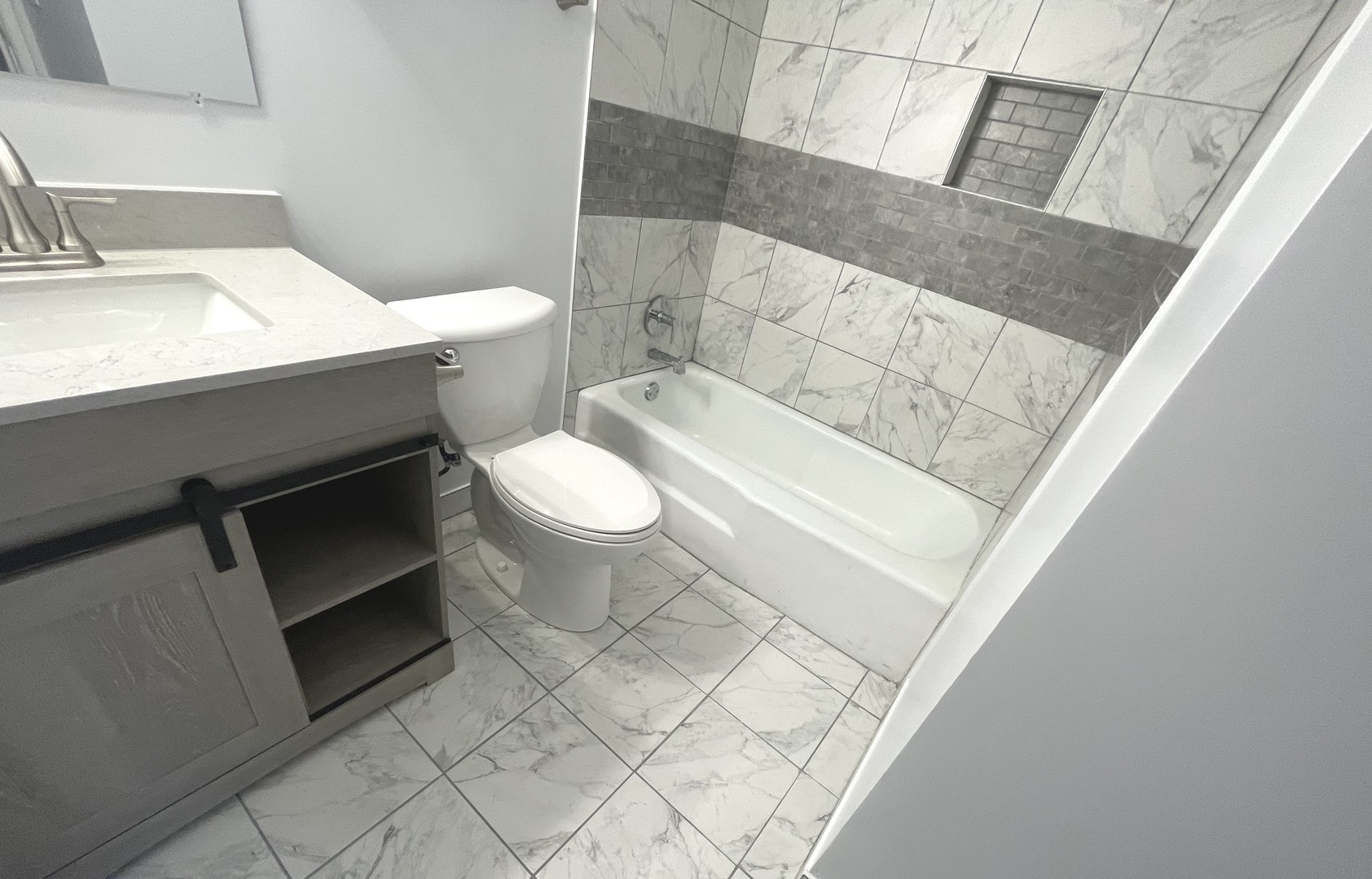 500 74th Street, Unit 102 Downers Grove, IL 60516 - Photo 9 of 21 a bathroom with a sink and a toilet