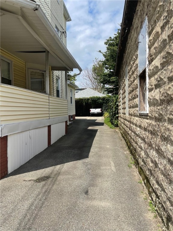 135 Grove Street Providence, RI 02909 - Photo 2 of 17 drive way w/ 2 car block garage