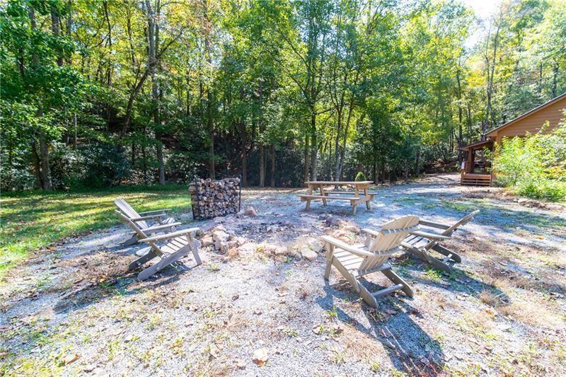2889 Old Parker Pl Road Ellijay, GA 30536 - Photo 39 of 59 a backyard of a house with trampoline