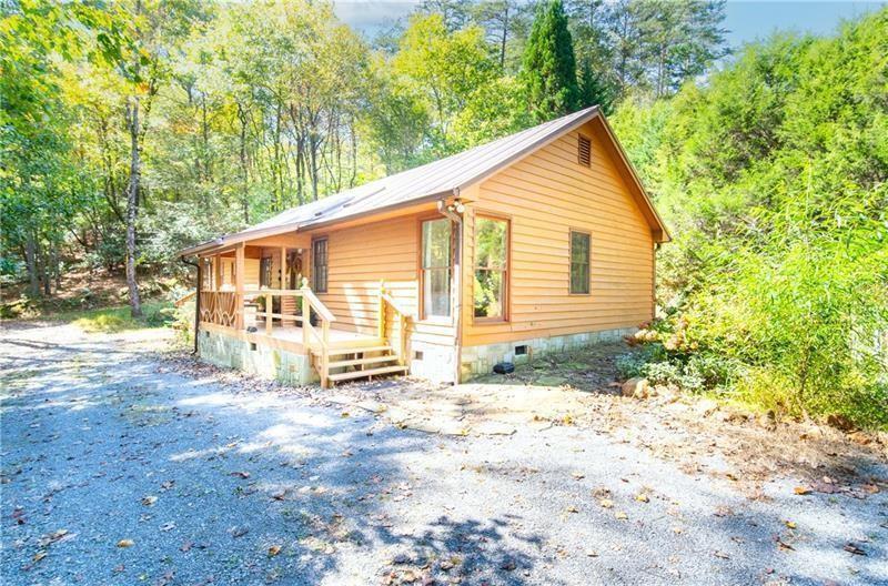 2889 Old Parker Pl Road Ellijay, GA 30536 - Photo 46 of 59 a view of backyard with a garden and seating area