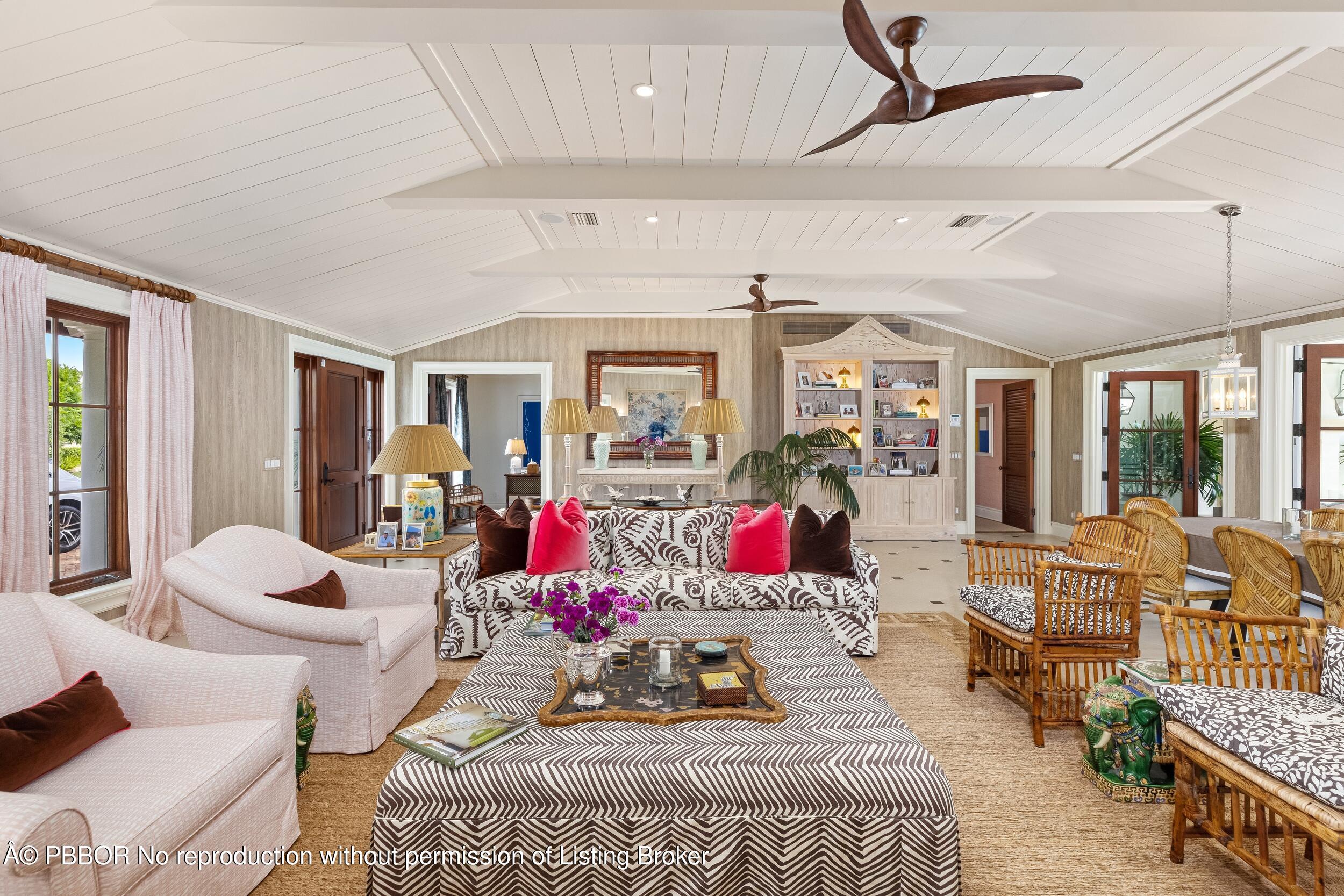 258 List Road Palm Beach, FL 33480 - Photo 6 of 45 a bed room with furniture and a chandelier