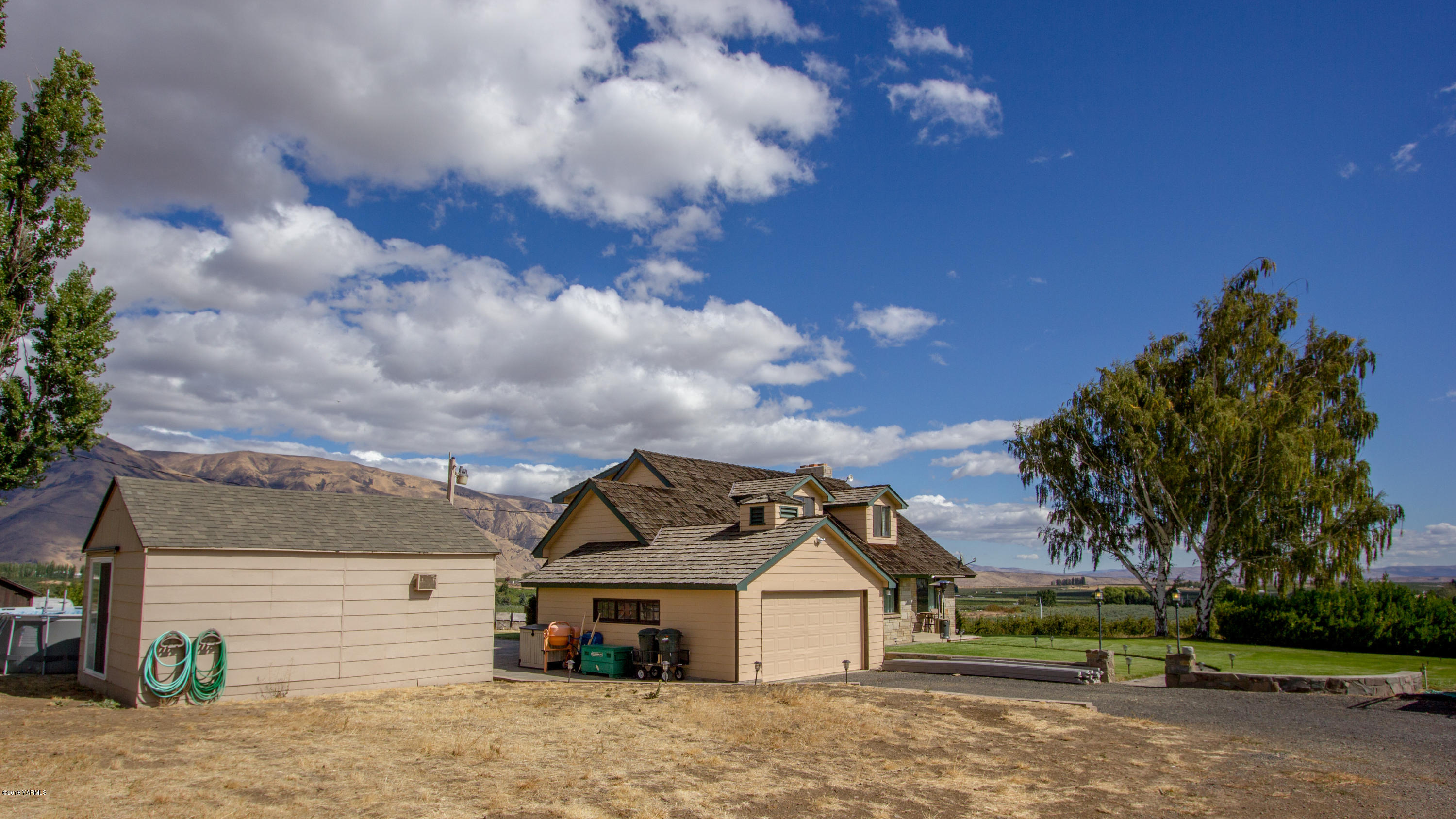 491 Section 1 Road Tieton, WA 98947 - Photo 2 of 23 a view of house with a yard