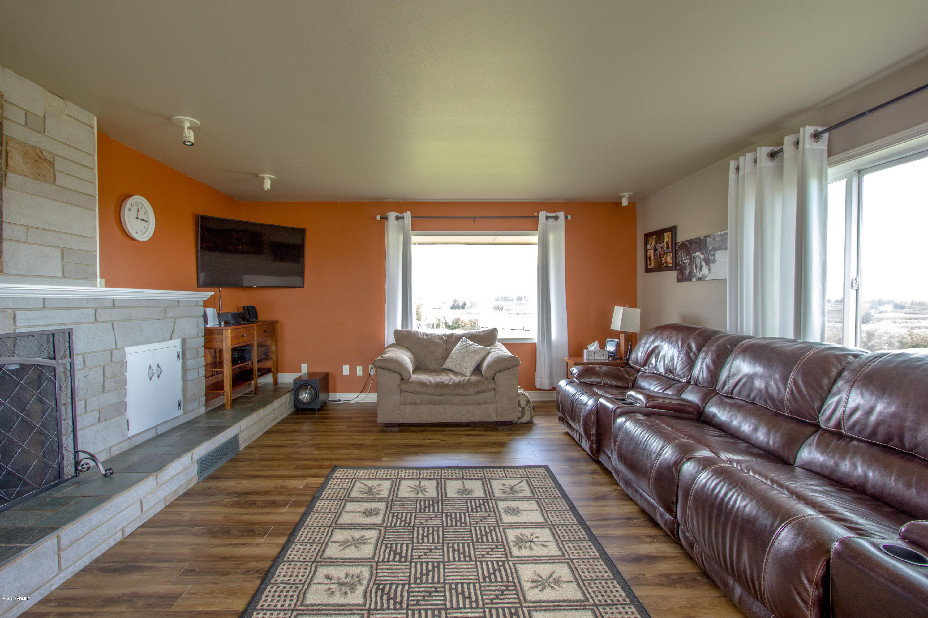 491 Section 1 Road Tieton, WA 98947 - Photo 11 of 23 a living room with furniture fireplace and window