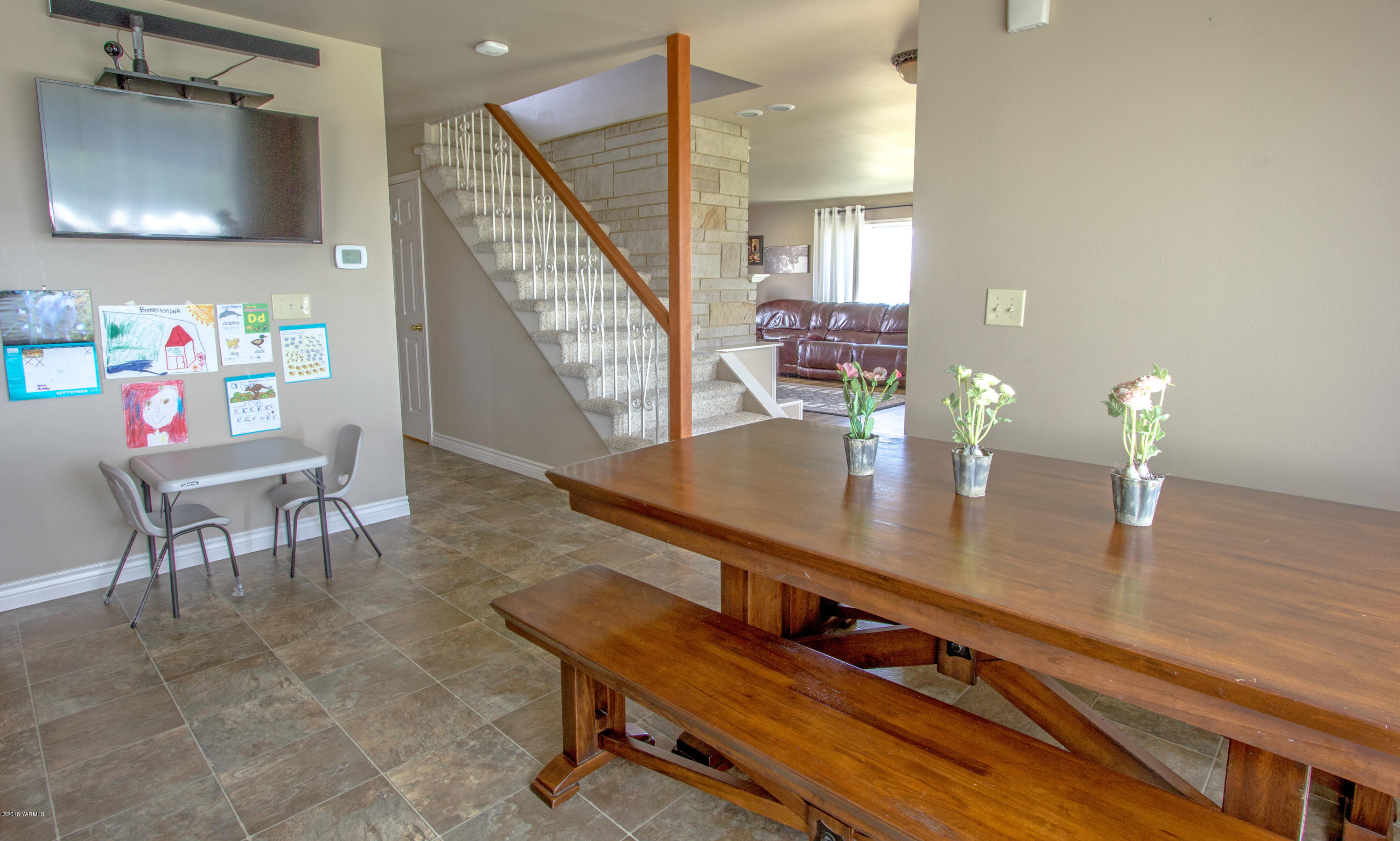 491 Section 1 Road Tieton, WA 98947 - Photo 14 of 23 a view of a dining room with furniture and a wooden floor