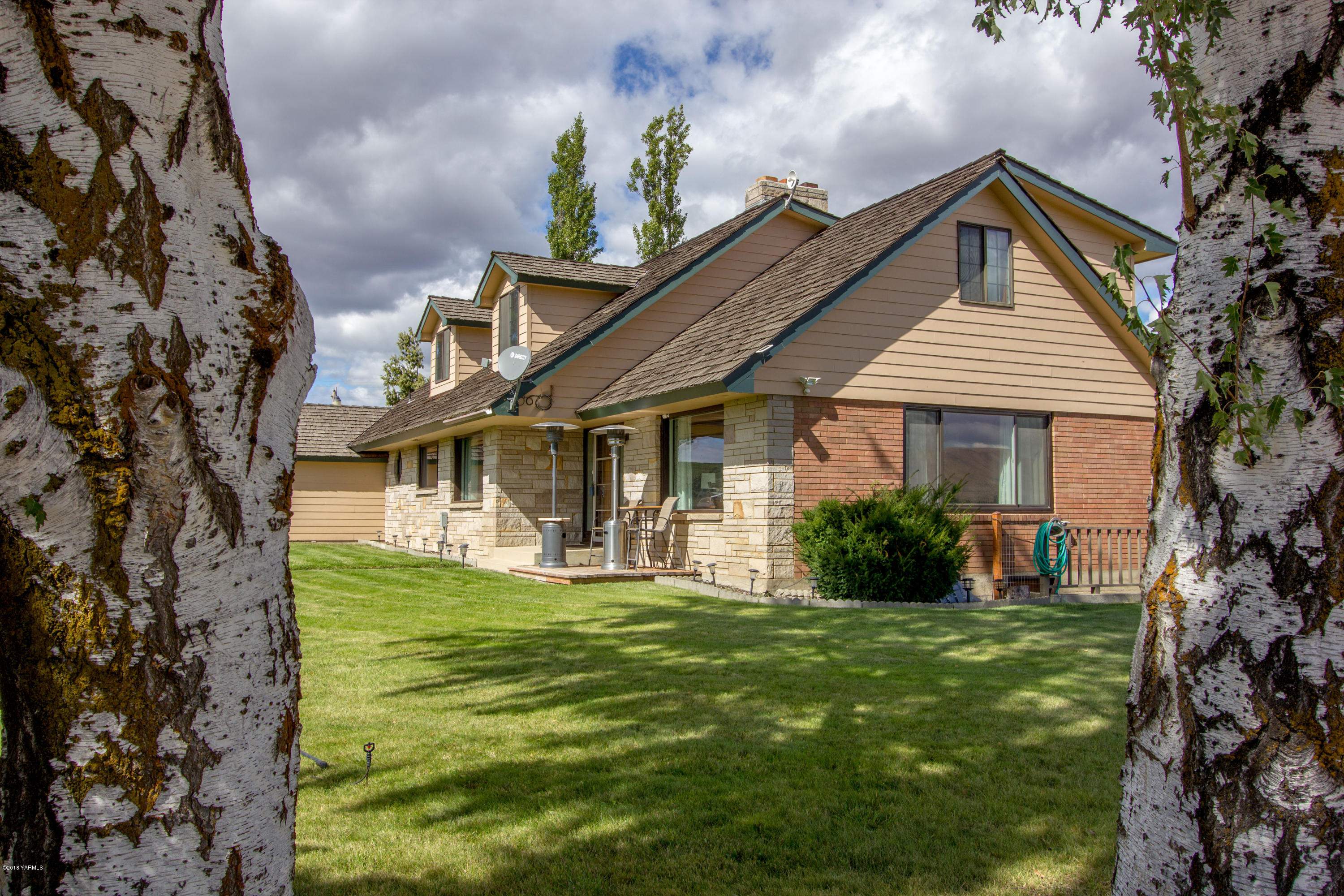 491 Section 1 Road Tieton, WA 98947 - Photo 3 of 23 a front view of a house with a yard
